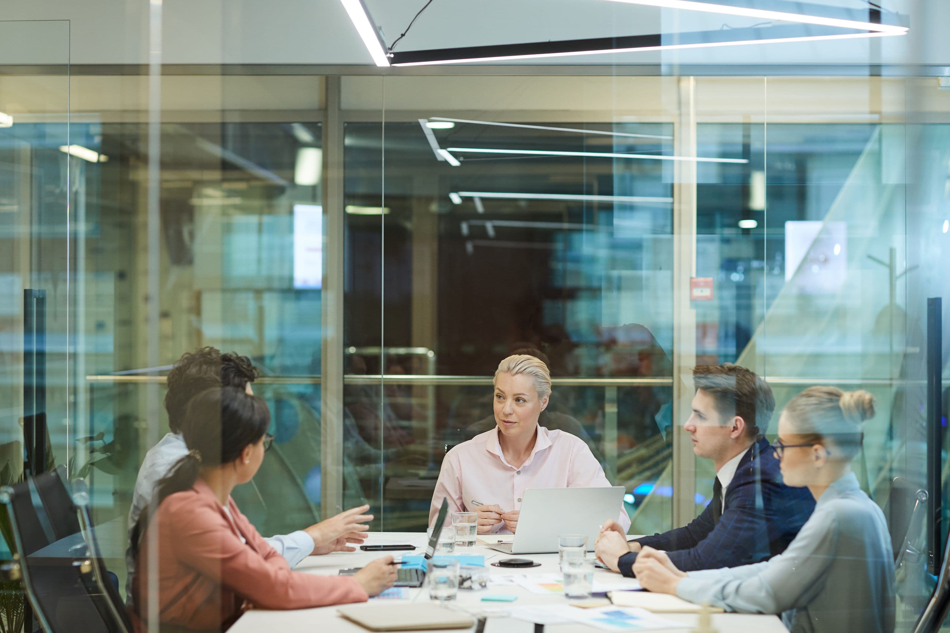 business-meeting-behind-the-glass-wall